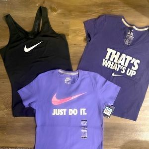Bundle of three women’s Nike shirts, all size medium